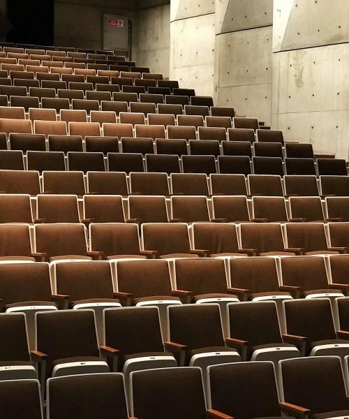 photography of theater chairs